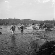 Переправа егерей вброд через реку. 1941